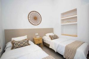 Posteľ alebo postele v izbe v ubytovaní Casa Marinero beach 3