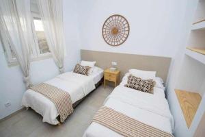 Posteľ alebo postele v izbe v ubytovaní Casa Marinero beach 3