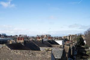 a view of roofs of houses in a city at Boutique Central Margate Apt. - edge of Old Town! in Margate