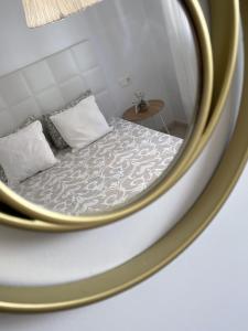 A bed or beds in a room at Malagadevacaciones - La Marea