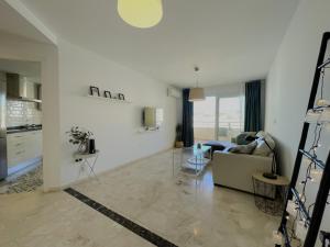 A kitchen or kitchenette at Malagadevacaciones - La Marea