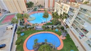 an overhead view of a large swimming pool in a city at VISTAMAR 33 in Benidorm