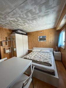 Postel nebo postele na pokoji v ubytování Ampio e caldo monolocale panoramico