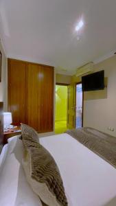 Postel nebo postele na pokoji v ubytování Hotel Sol Sanlúcar