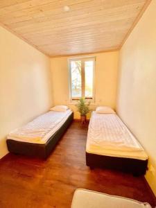 Säng eller sängar i ett rum på Chill Inn with sauna