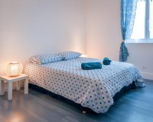 Posteľ alebo postele v izbe v ubytovaní Gîte de Lisle