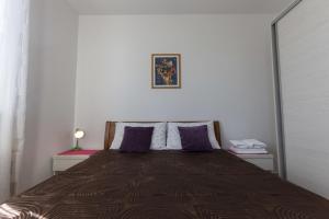 Postel nebo postele na pokoji v ubytování Guesthouse Santin