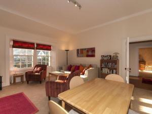 a living room with a couch and a table at Nungate in North Berwick