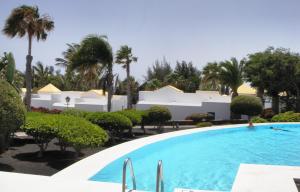 a view of the pool at the resort at Sandos Atlantic Gardens in Playa Blanca