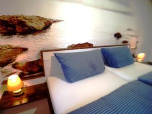 Ein Bett oder Betten in einem Zimmer der Unterkunft Strandfeeling