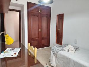 Postel nebo postele na pokoji v ubytování Céntrico Apartamento Jardines de Vallellano