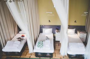 Postel nebo postele na pokoji v ubytování Hostel Jamaika