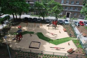 an aerial view of a playground in a city at THE SOUL of Nowa Huta - free garage in Kraków