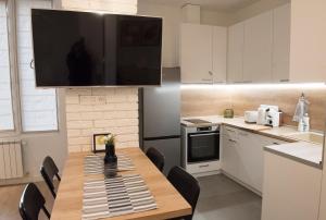 A kitchen or kitchenette at Top Center Designer Studio Apartment Még 12 kép