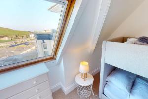 Postel nebo postele na pokoji v ubytování ILFRACOMBE ORIEL 3 Bedrooms