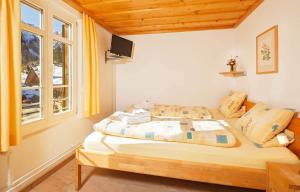 Postel nebo postele na pokoji v ubytování Griesalp Hotels