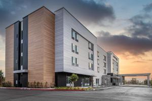 a rendering of the front of a building at SpringHill Suites by Marriott Riverside Redlands in Redlands