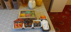 a counter top with several boxes of food on it at The Clifton at Paignton in Paignton