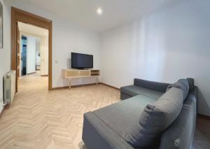 TV a/nebo společenská místnost v ubytování Stay U-nique Apartments Calabria