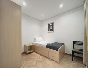 Postel nebo postele na pokoji v ubytování Stay U-nique Apartments Calabria