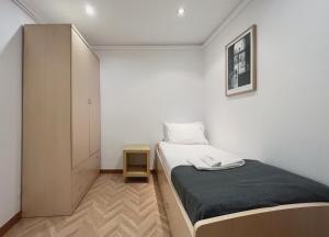 Postel nebo postele na pokoji v ubytování Stay U-nique Apartments Calabria