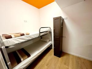 Postel nebo postele na pokoji v ubytování Arc House Madrid - Puerta del Sol Only Adults