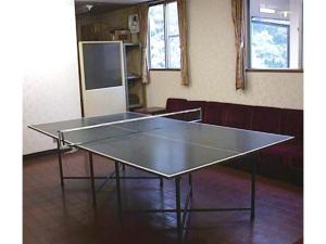 a ping pong table in the middle of a room at Hotel Platon - Vacation STAY 62238v in Chikuma