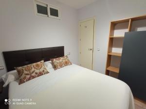 Postel nebo postele na pokoji v ubytování Apartamento playa
