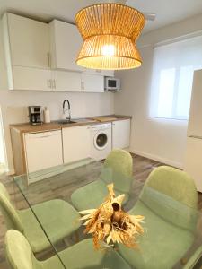 Kuchyň nebo kuchyňský kout v ubytování Apartamento La Merced