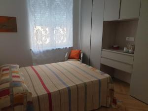 Postel nebo postele na pokoji v ubytování ORTI19