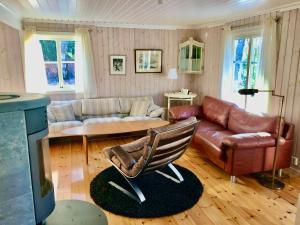 Area soggiorno di Lake and Forest Hideaway