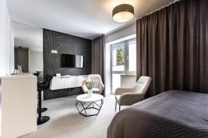 Postel nebo postele na pokoji v ubytování K20 Apartamenty Łódź - Dostęp na Kod