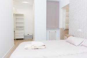 Ένα ή περισσότερα κρεβάτια σε δωμάτιο στο Apartamento DENVER - Centro, Nuevo, Diseño, Wifi