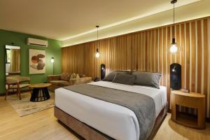 Postel nebo postele na pokoji v ubytování Blues Suites Medellín