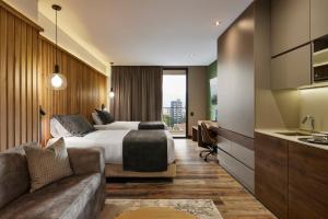 Postel nebo postele na pokoji v ubytování Blues Suites Medellín