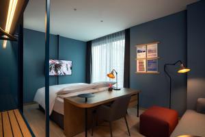 Ein Bett oder Betten in einem Zimmer der Unterkunft RYSE, Autograph Collection by Marriott