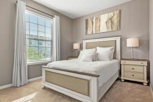 Postel nebo postele na pokoji v ubytování 5 Bedrooms 45 Bathrooms Windsor At Westside 8917 Sa + 32 fotografií
