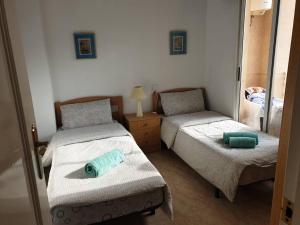 Postel nebo postele na pokoji v ubytování Nice holidays apartment in Torreveja, + 35 fotografií