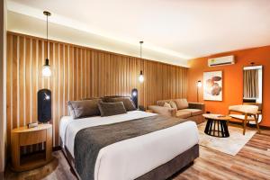 Postel nebo postele na pokoji v ubytování Blues Suites Medellín
