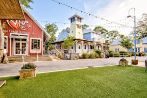 an empty street in a town with buildings at Baytowne Wharf - Observation Point North #460 in Destin