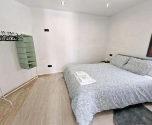 Postel nebo postele na pokoji v ubytování APARTAMENTO CON TERRAZA Y BARBACOA