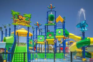 a water park with a colorful water slide at Beachside Holiday Park in Normanville