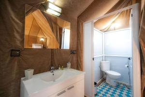 Koupelna v ubytování Dunes Luxury Camp