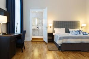 Voodi või voodid majutusasutuse Elite Stadshotellet Karlstad, Hotel & Spa toas