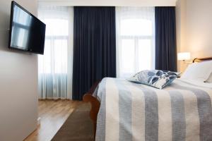 Voodi või voodid majutusasutuse Elite Stadshotellet Karlstad, Hotel & Spa toas