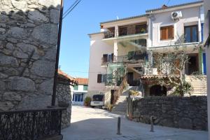 a view of a house from the street at Apartment Paula in Njivice