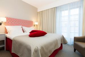 Voodi või voodid majutusasutuse Elite Stadshotellet Karlstad, Hotel & Spa toas