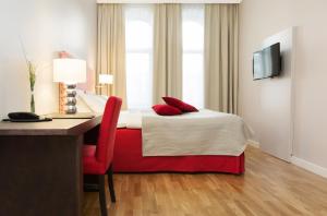 Televiisor ja/või meelelahutuskeskus majutusasutuses Elite Stadshotellet Karlstad, Hotel & Spa