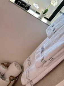 a pair of pink socks sitting next to a window at M Luxury Home In Irene Centurion-No Blackouts in Centurion