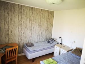 Postel nebo postele na pokoji v ubytování Falkenberg /Vinberg